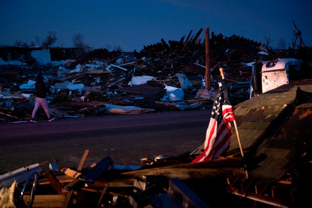 Tornado damage is seen after extreme weather hit the region December 11, 2021, in Mayfield, Kentucky. Dozens of devastating tornadoes roared through five US states overnight, leaving more than 80 people dead Saturday in what President Joe Biden said was one of the largest storm outbreaks in history. AFPpix