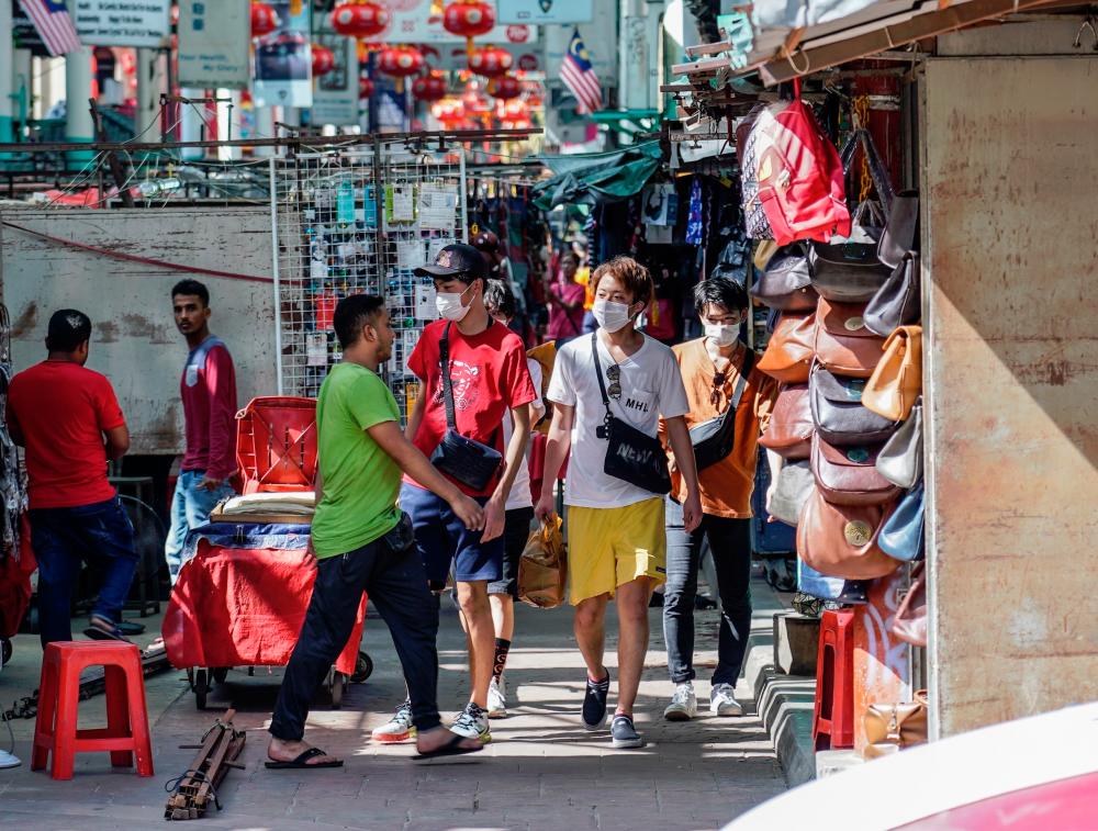 A recent scene in Petaling Street, Kuala Lumpur. The Covid-19 outbreak will have a significant impact on the local tourism industry. – AMIRUL SYAFIQ MOHD DIN/THESUN