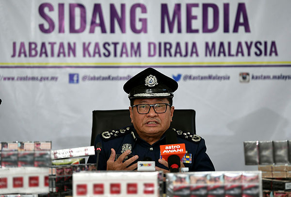Customs director-general Datuk Seri Paddy Abdul Halim at a press conference regarding seized contraband cigarettes in Kemaman today. — Bernama