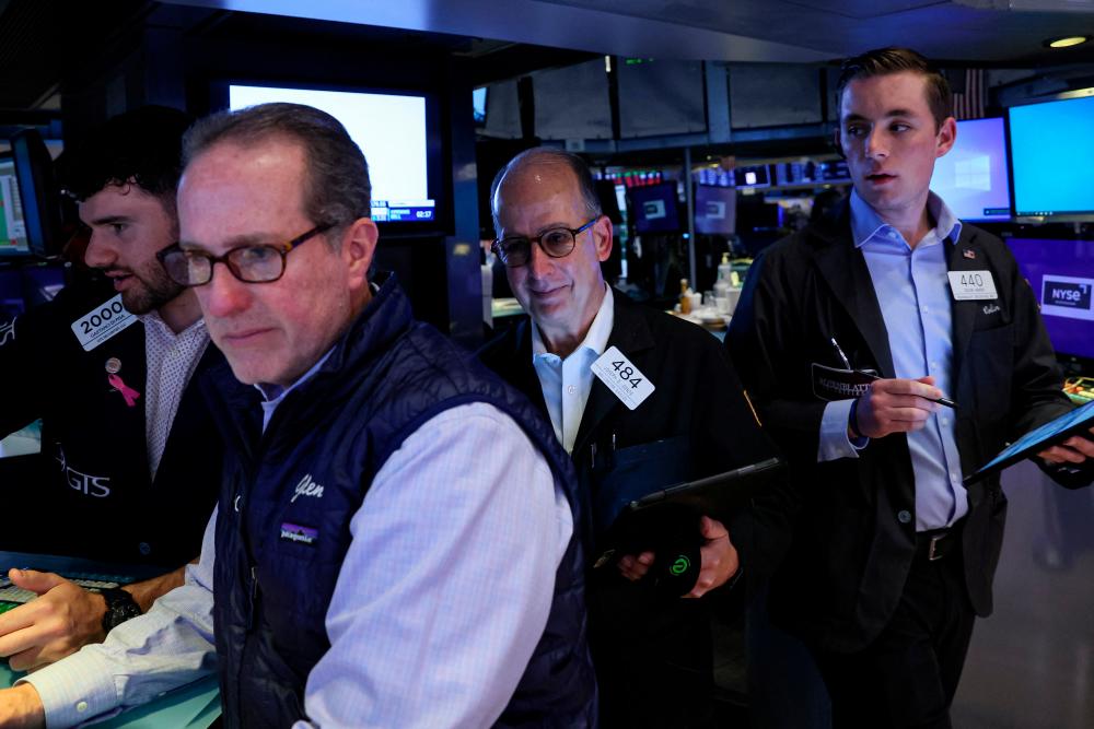 Traders working on the floor of the New York Stock Exchange on Wednesday, May 10, 2023. – Reuterspic