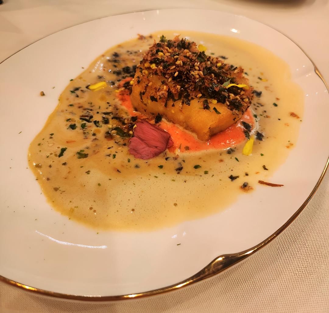 Atlantic Cod fish is served with taramasalata cream and seaweed butter. $!Atlantic Cod fish is served with taramasalata cream and seaweed butter.