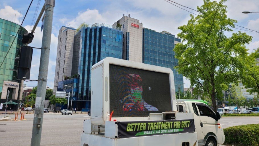 Ahgases demand better treatment for GOT7 with protest truck