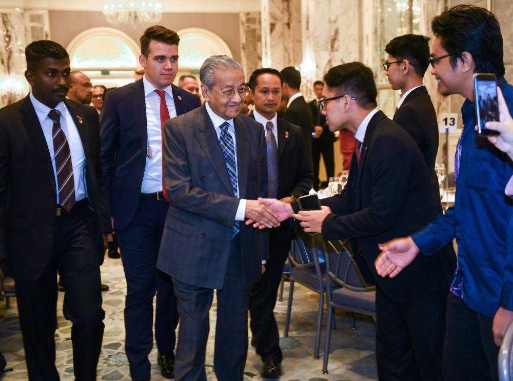 Prime Minister Tun Dr Mahathir Mohamad meets with Malaysian students in Turkey after attending a tea party with the Malaysian diaspora at the Shangri-La Bosphorus Hotel on July 27, 2019. - Bernama