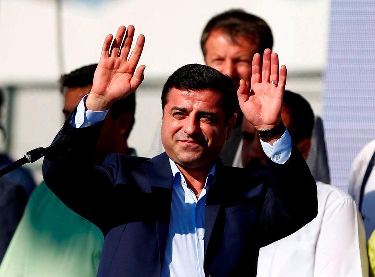 Selahattin Demirtas, co-leader of the pro-Kurdish Peoples' Democratic Party (HDP), greets the crowd during a peace rally to protest against Turkish military operations in northern Syria, in Istanbul, Turkey, September 4, 2016. - REUTERSPIX