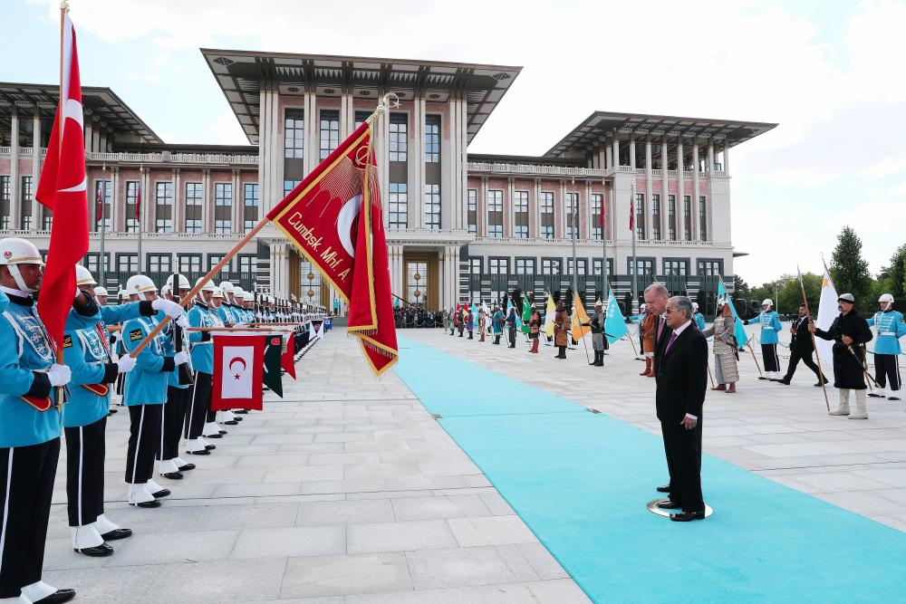 Turkish President Tayyip Erdogan welcomes Prime Minister Tun Dr Mahathir Mohamad at the Presidential Palace in Ankara, Turkey, July 25, 2019. - Reuters