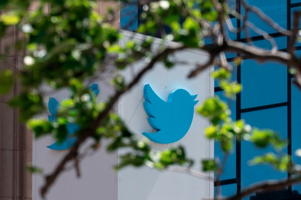 The Twitter logo is seen at their headquarters in downtown San Francisco, California. Twitter’s lawsuit filed in the US state of Delaware urges the court to order the billionaire to complete his deal to buy Twitter. – AFPpix