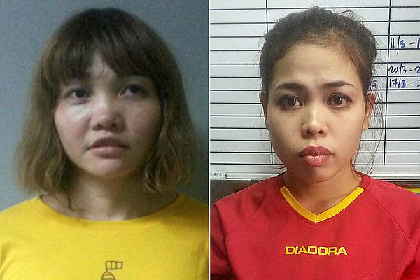 File pix of the two suspects Siti Aisyah (R) and Doan Thi Huong.