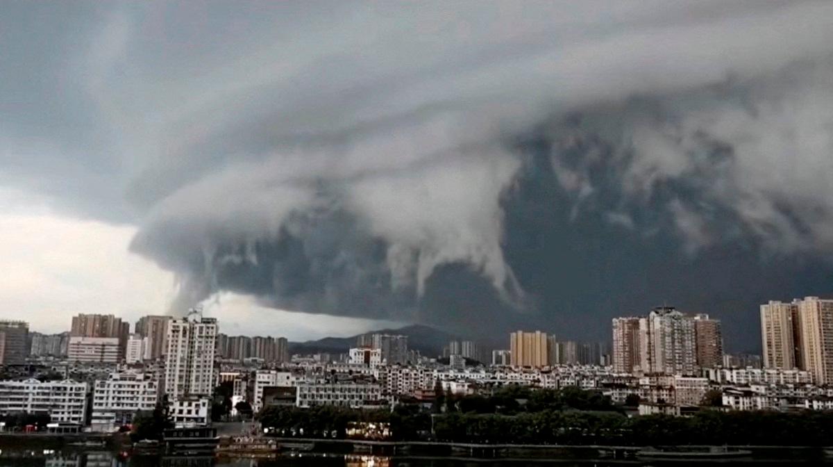 A view shows dark cloud approaching the city of Zhuhai as Typhoon Wipha makes landfall, Guangdong Province, China, July 20, 2025, in this screen grab obtained from a social media video. - SOCIAL MEDIA/via REUTERS - Location was verified by buildings, water body, urban layout and terrain which match satellite and file images. - Date was verified by Zhuhai government release on WeChat on Sunday (July 20).