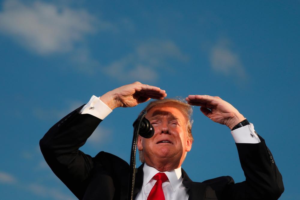 US President Donald Trump reacts as he addresses a Trump 2020 re-election campaign rally in Montoursville, Pennsylvania, US May 20, 2019. - Reuters