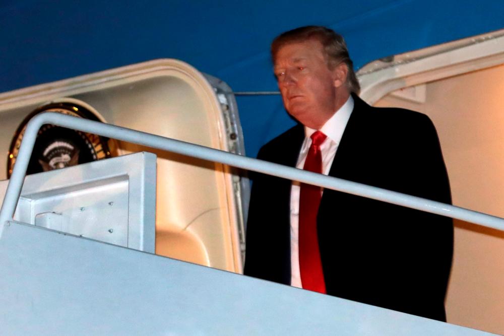 US President Donald Trump arrives at Joint Base Andrews in Maryland upon his return to Washington after a weekend in West Palm Beach, Florida, US, February 2, 2020. - Reuters