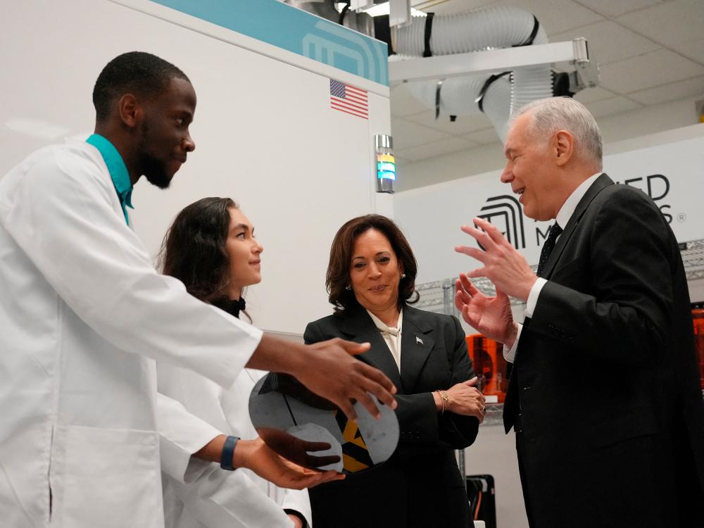 Harris stands next to Dickerson (right) and Applied Materials employees Yann Lapnet and Satomi Angelika Murayama as she tours a site in Sunnyvale, California. on Monday, May 22, 2023, where the company plans to build a research facility. – Reuterspic