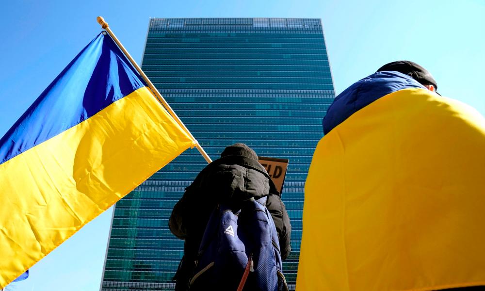 A protester with a Ukranian flag demonstrates outside the United Nations headquarters in New York on March 2, 2022. AFPPIX