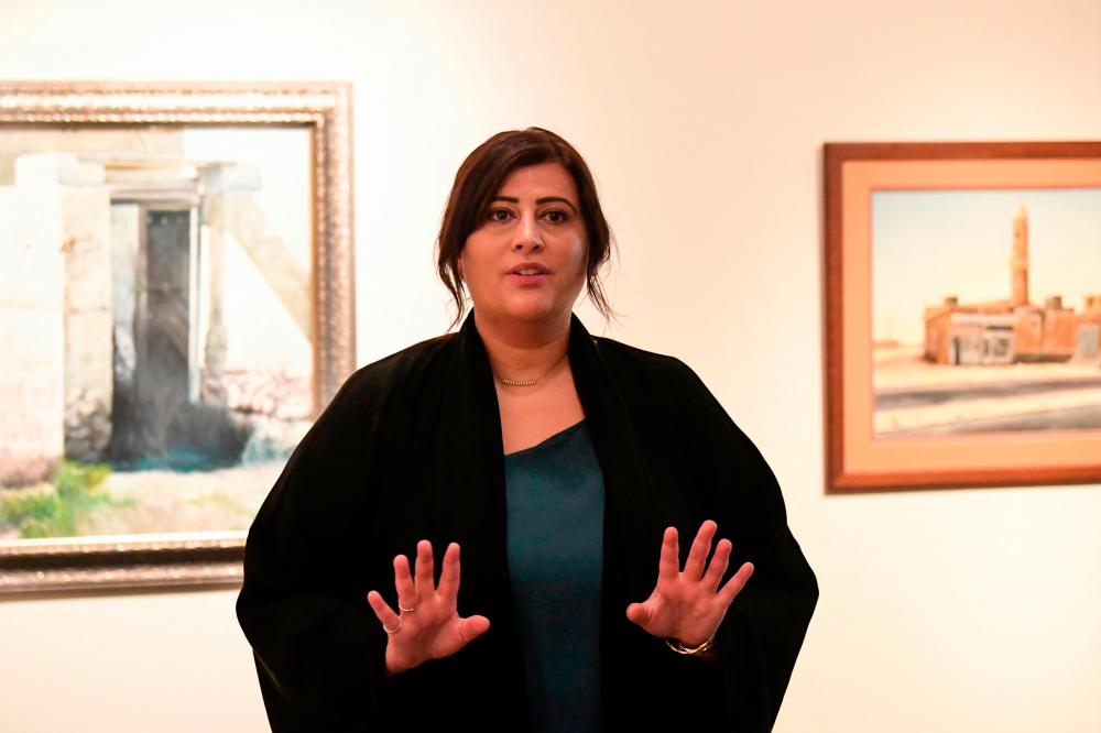 Manal Ataya, director-general of the Sharjah Museum Authority, speaks during an interview with AFP at the Sharjah Art Museum on August 24, 2020. AFP / Karim SAHIB