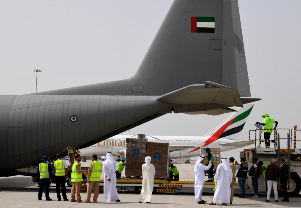 Tonnes of medical equipment and coronavirus testing kits provided bt the World Health Organisation are pictured at the al-Maktum International airport in Dubai on March 2, 2020 as it is prepared to be delivered to Iran with a United Arab Emirates military transport plane. - AFP