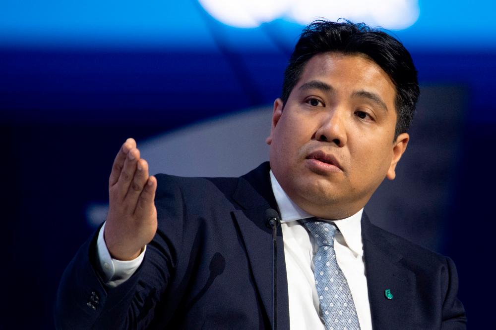 Petronas CEO Tan Sri Tengku Muhammad Taufik Tengku Aziz speaking at the panel discussion during the Abu Dhabi International Petroleum Exhibition and Conference on Monday. – AFPpic