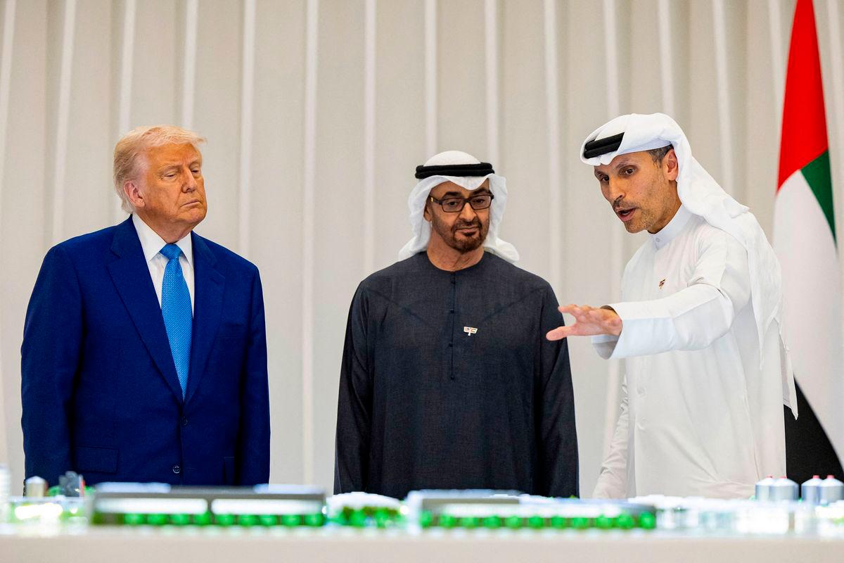 US President Donald Trump (L) and UAE President Sheikh Mohamed bin Zayed al-Nahyan (C) listen, as Mubadala CEO Khaldoon Khalifa al-Mubarak (R) speaks in front of a model of the UAE USA AI Cluster, during the launching ceremony in Abu Dhabi on May 15, 2025. The United Arab Emirates is the third leg of Trump’s visit to the region, which has already taken him to Saudi Arabia and Qatar.AFPpix