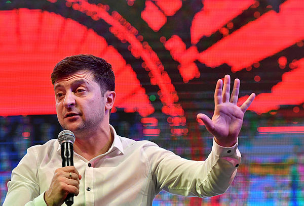 Ukrainian comic actor, showman and presidential candidate Volodymyr Zelensky speaks as he performs with his ‘95th block’ comedy group in the small town Brovary, near Kiev, on March 29, 2019. — AFP