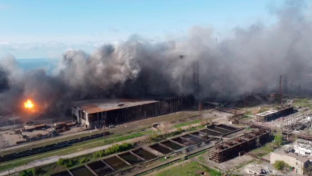 An aerial view shows shelling in the Azovstal steel plant complex, amid Russia's invasion of Ukraine, in Mariupol, Ukraine, in this screen grab taken from a handout video released on May 5, 2022. Azov Regiment/Handout via REUTERSpix