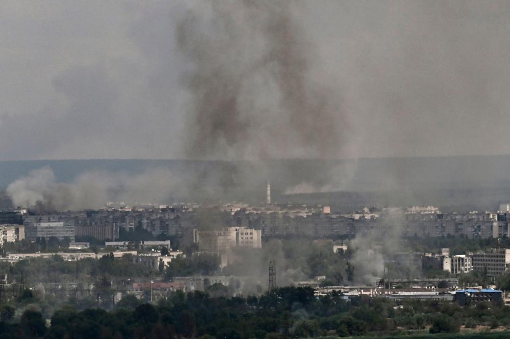Smoke and dirt rise from the city of Severodonetsk in the eastern Ukrainian region of Donbas on June 17, 2022, as the Russian-Ukraine war enters its 114th day. AFPPIX