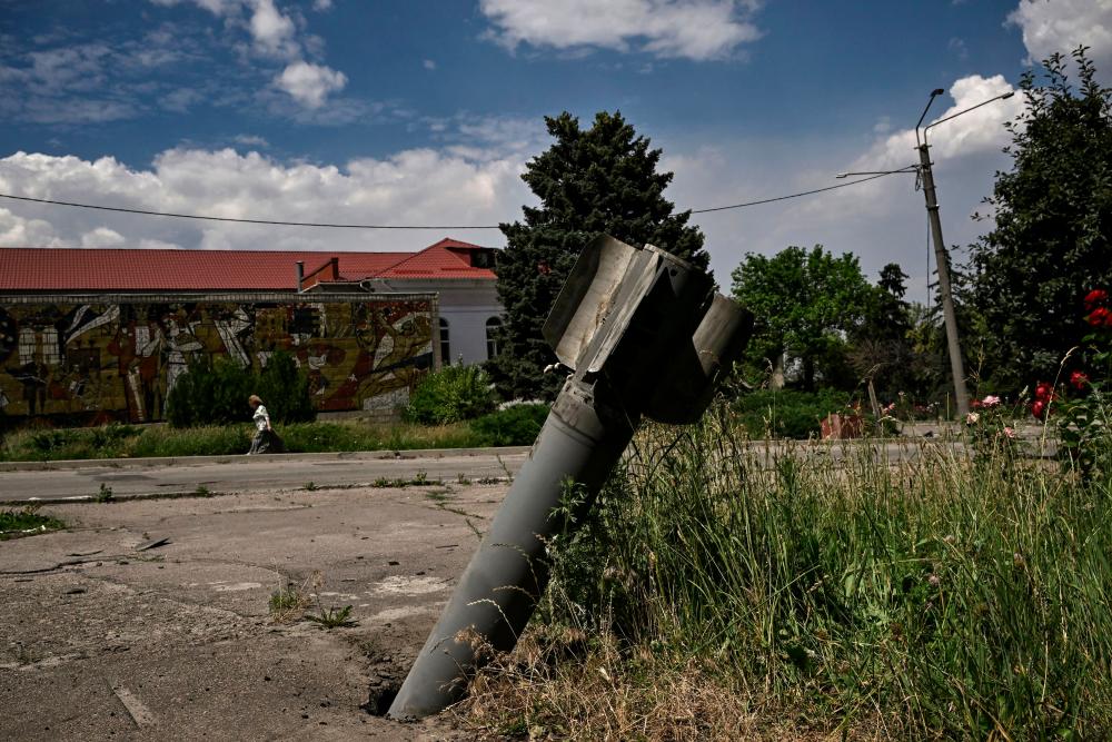The tail of a rocket is nailed into a pavement in the city of Lysychansk at the eastern Ukrainian region of Donbas on June 17, 2022, as the Russian-Ukraine war enters its 114th day. AFPPIX