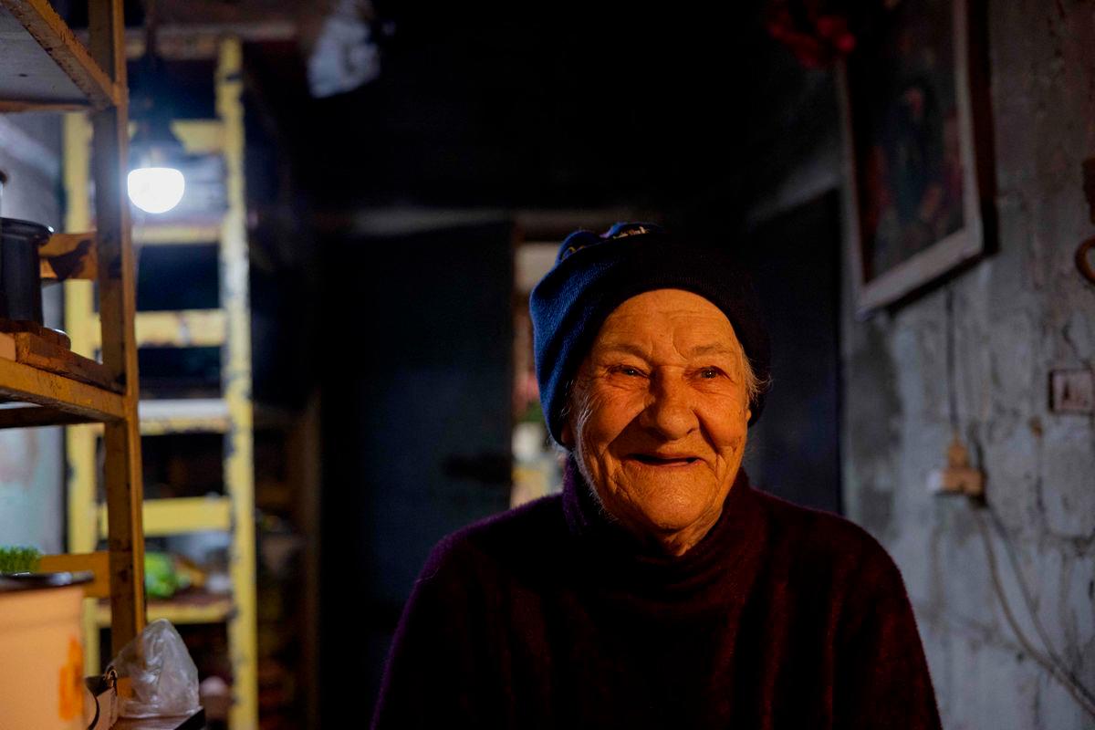 Lidia Isayeva, 86 is walking in the basement where she lives of her heavily damaged building in the town of Lyman, near the frontline in the Donetsk region, on May 7, 2025. AFPpix