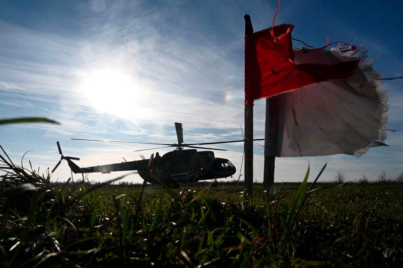 A Mi-8 military helicopter takes off during a training flight at an undisclosed location in Lviv region on November 7, 2024, amid the Russian invasion of Ukraine. - AFPPIX