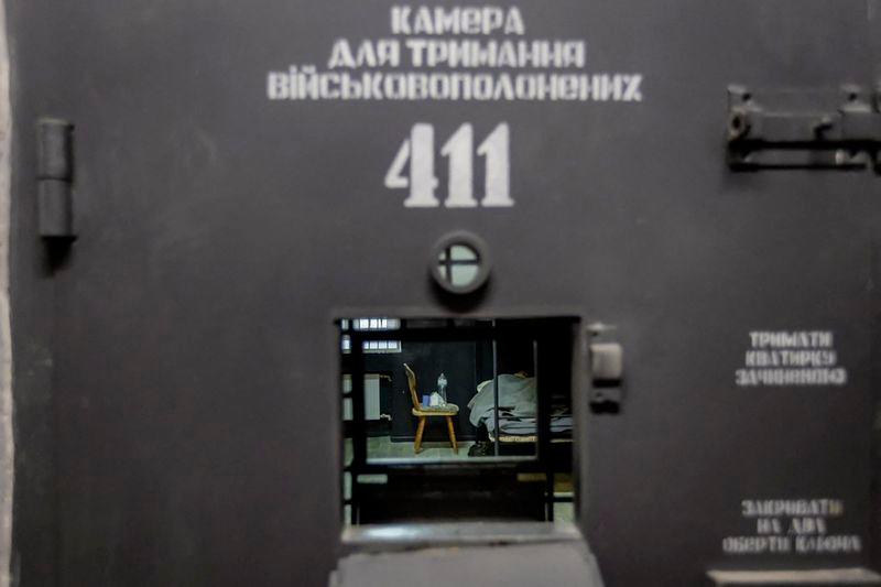 This undated handout photograph released by the Ukrainian Presidential Press Service on January 11, 2025 shows an alleged North Korean soldier lying in a cell at an undisclosed location in Ukraine. - AFPPIX