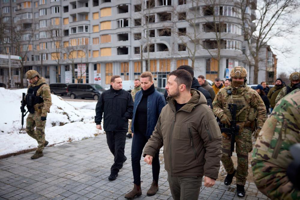 This handout picture taken and released by Ukrainian Presidential Press Service on January 30, 2023, shows Ukraine’s President Volodymyr Zelensky and Danish Prime Minister Mette Frederiksen during their visit to the city of Mykolaiv, near the Black Sea in southern Ukraine. AFPPIX