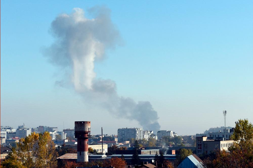 Smoke rises above buildings in the western Ukrainian city of Lviv after Russian missile strike on October 10, 2022, amid Russian invasion of Ukraine. AFPPIX