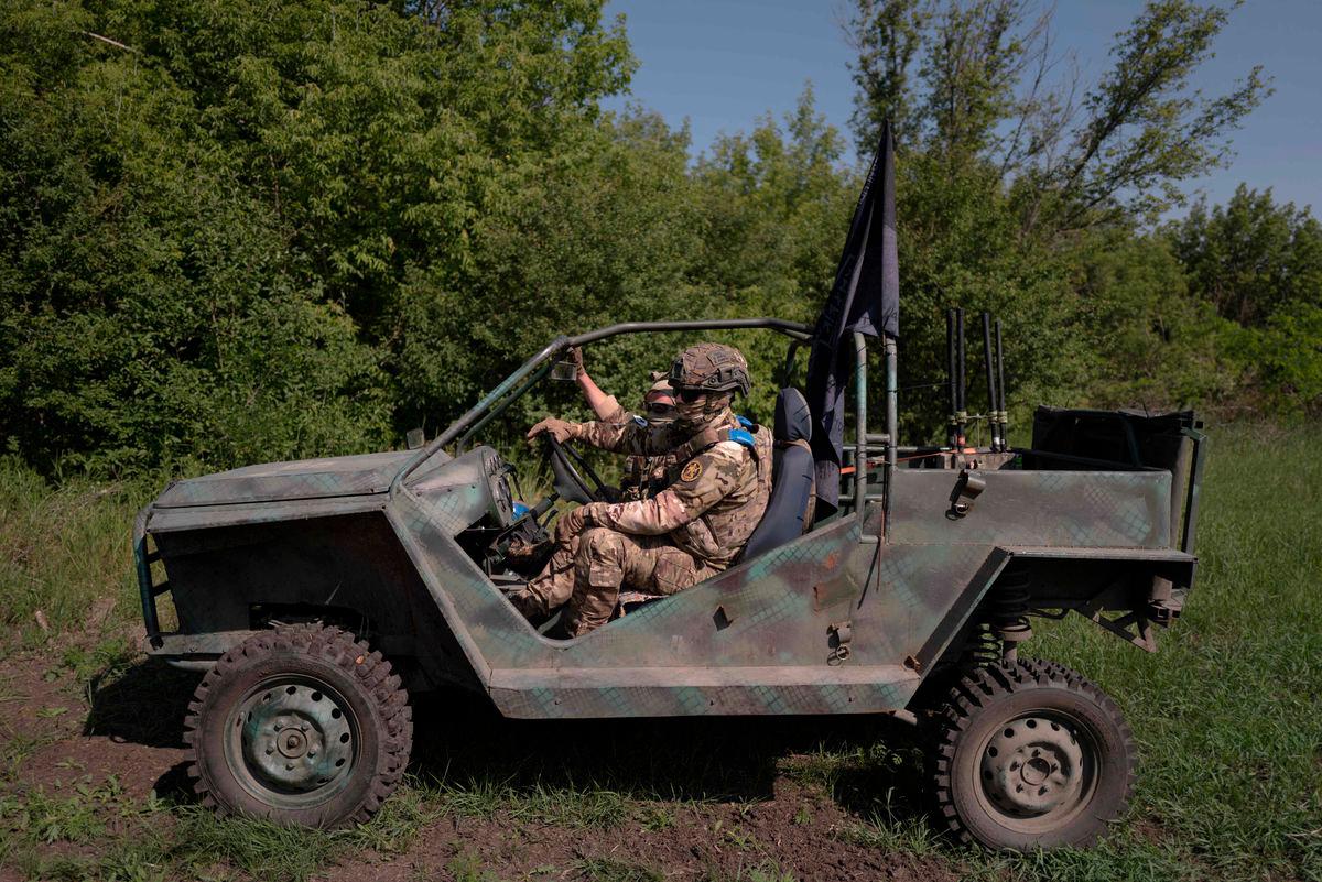 Soldiers from the 3rd operation Spartan brigade of the national guard of Ukraine drive a buggy during a demonstration to AFP, at an undisclosed location, not far from the front line, in the region of Dnipropetrovsk, Ukraine, on June 14, 2025, amid the russian invasion of Ukraine. Ukrainian army logistics have become the priority target for Russian drones. - AFPPIX
