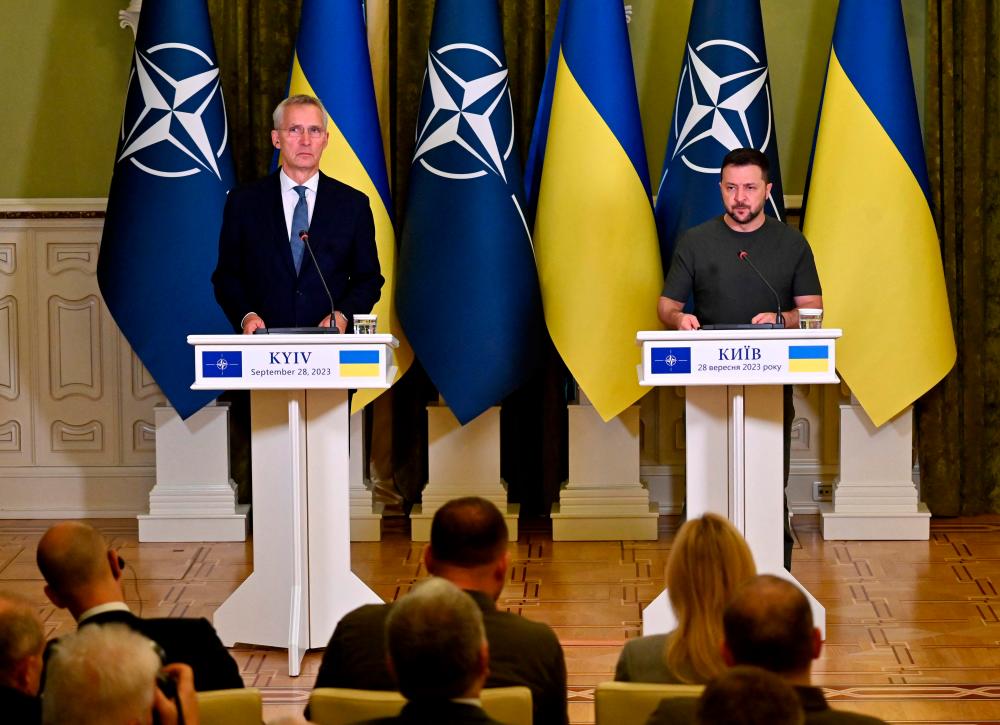 Ukrainian President Volodymyr Zelensky (R) and Secretary General of NATO Jens Stoltenberg address a press conference following talks in Kyiv//AFPix
