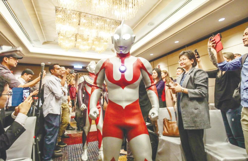 Ultraman Tiga (back) and Ultraman (front) at the Tsuburaya Productions press conference in Kuala Lumpur on Aug 8, 2019. – AMIRUL SYAFIQ MOHD DIN/THESUN