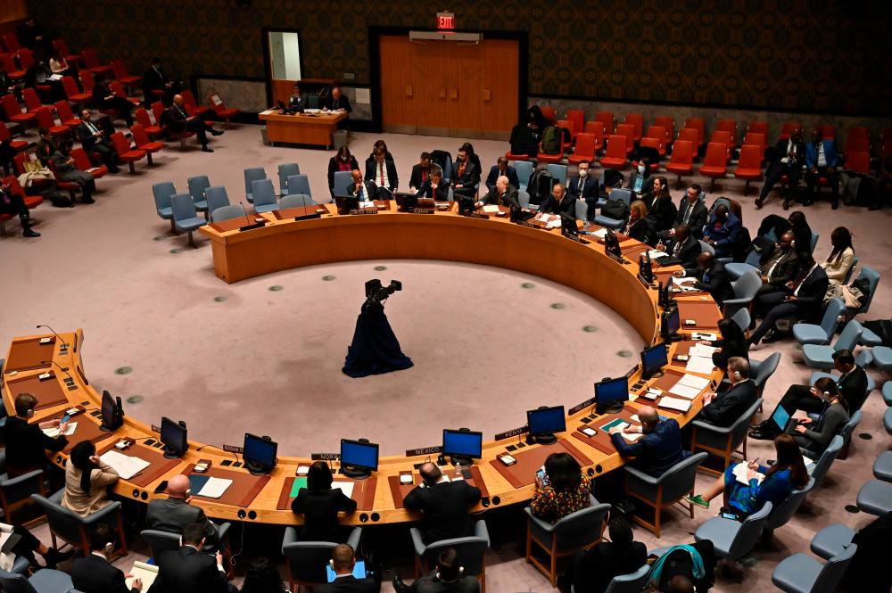 A general view shows a United Nations Security Council meeting during a vote on a draft resolution calling for an immediate end to violence in Myanmar and release of political prisoners, at the UN headquarters in New York on December 22, 2022. AFPPIX