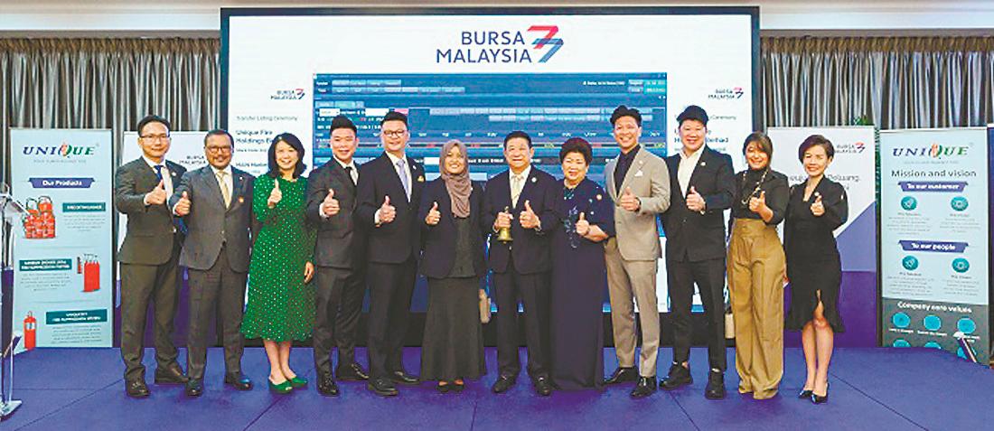 From left: Unique Fire non-executive director Tee Kiam Hong; Alliance Islamic Bank CEO Rizal IL-Ehzan Fadil Azim; Alliance Bank Malaysia group chief corporate and institutional banking officer Teoh Chu Lin; Unique Fire executive directors Liew Kang Chin and Marcus Liew, chairperson Selma Enolil Mustapha Khalil, founder and group managing director Liew Sen Hoi and spouse Lim Show Ching, executive director Liew Kang Yee, digital solutions director Liew Kang Boon, and non-executive directors Olivia Lim and Andrea Huong Jia Mei.