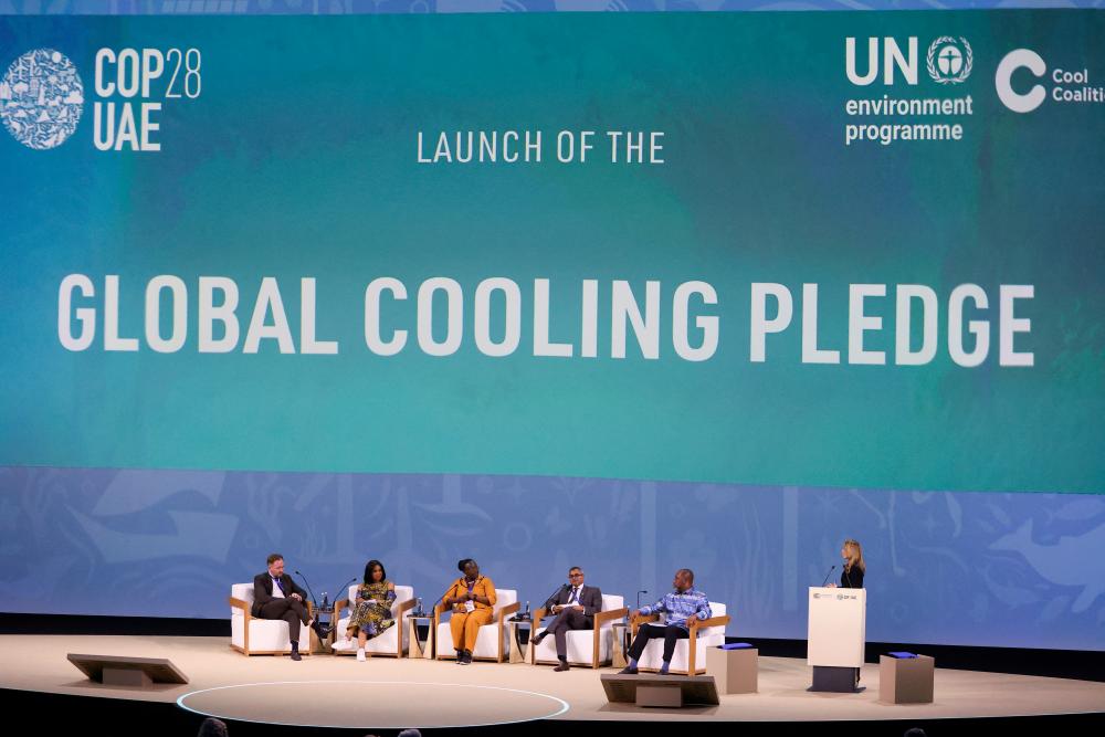 A session on the Global Cooling Pledge aimed at reducing emissions and exploring sustainable cooling solutions at COP28 in progress in Dubai on Tuesday. Countries at COP28 are considering calling for a formal phase-out of fossil fuels as part of the United Nation summit's final deal to tackle global warming. –Reuterspic