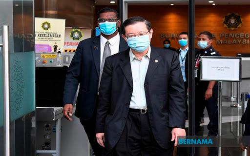 Lim Guan Eng leaves MACC Hq to face charges at KL Court. -Bernama