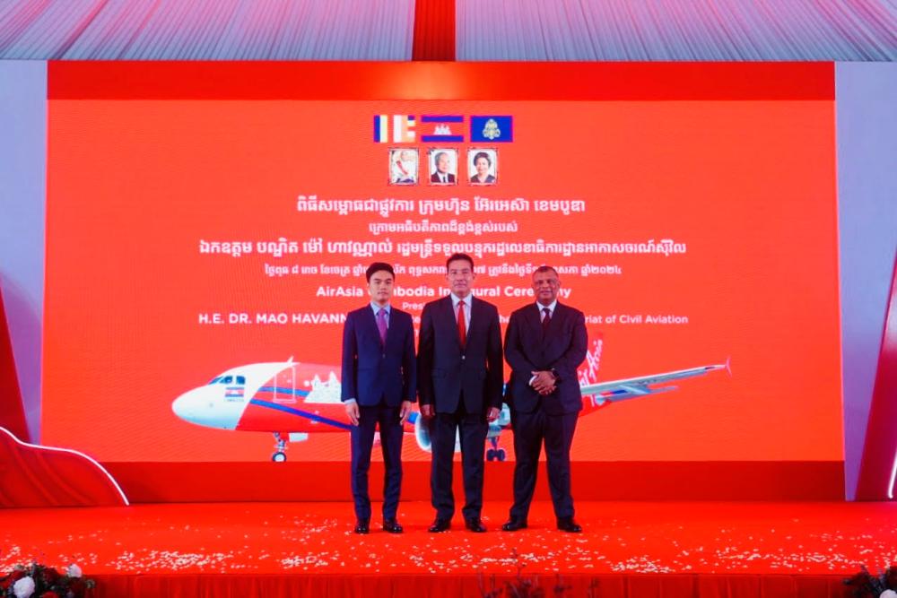 $!(From left) Nam, Minister in Charge of State Secretariat of Civil Aviation, Dr Mao Havannall and Fernandes at the commemoration ceremony of AirAsia Cambodia at Phnom Penh.