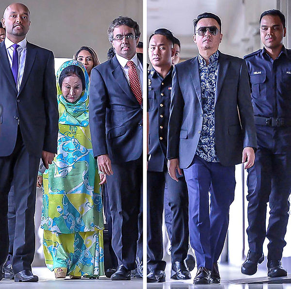 Datin Seri Rosmah Mansor (two, left), wife of former prime minister Najib and Rosmah’s former aide, Datuk Rizal Mansor (two, right). — Sunpix by Adib Rawi Yahya