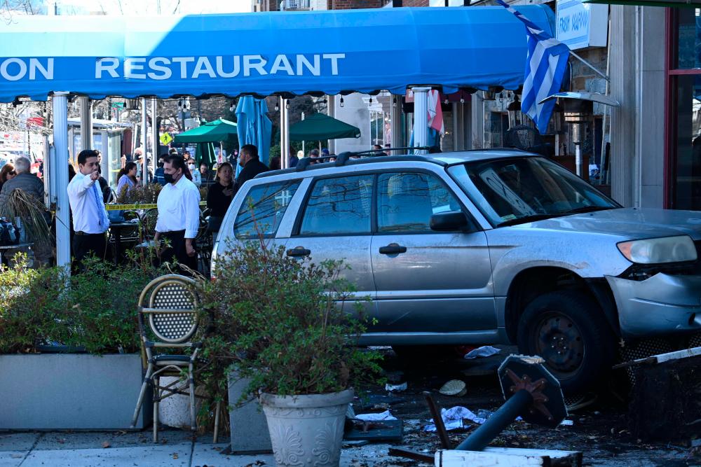 2 dead, 9 injured after vehicle crashes into outdoor seating of restaurant in US capital