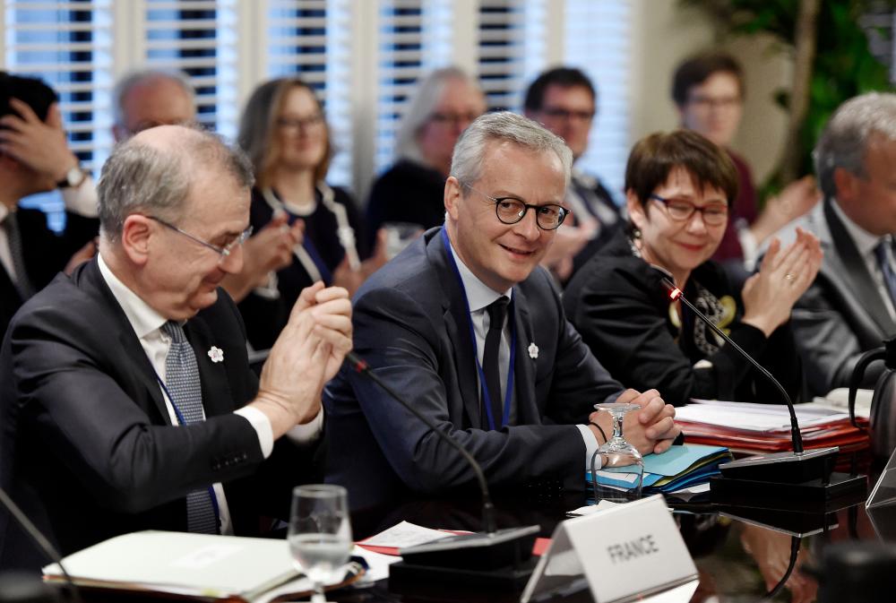 France's finance minister Bruno Le Maire looks on during a meeting between the Finance Ministers and Central Bank Governors of the G7 nations during the IMF and World Bank Fall Meetings on Oct 17, 2019 in Washington, DC. — AFP