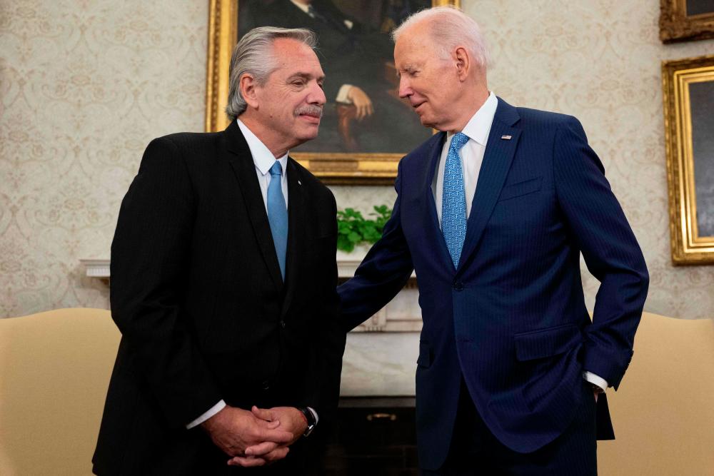 US President Joe Biden and President Alberto Fernandez of Argentina hold a bilateral meeting in the Oval Office of the White House in Washington, DC, on March 29, 2023. AFPPIX
