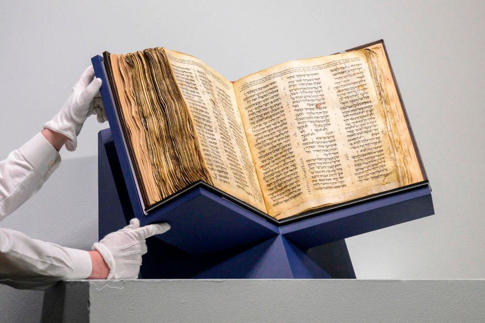 The Codex Sassoon is auctioned at Sotheby’s in New York City on May 17, 2023/AFPpix
