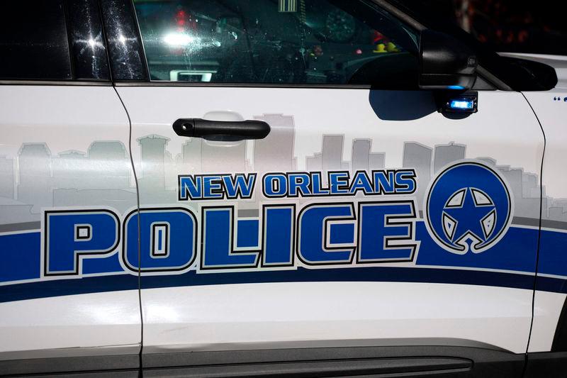 A police car on scene outside a house fire on Mandeville Street that may be connected to the mass casualty Bourbon Street attack - AFPpix