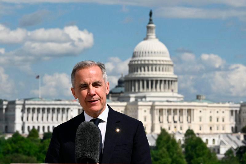 Canadian Prime Minister Mark Carney speaks to the media after a meeting with US President Donald Trump at the Embassy of Canada to the United States in Washington, DC, on May 6, 2025. AFPpix