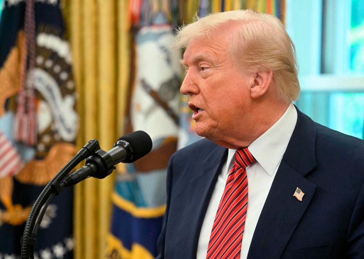 US President Donald Trump speaks during a swearing-in ceremony for the Ambassador to China, former Republican Senator of Georgia, David Perdue at the White House in Washington, DC, May 7, 2025. AFPpix