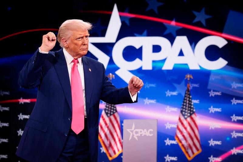 U.S. President Donald Trump reacts to the crowd while arriving at the Conservative Political Action Conference (CPAC) at the Gaylord National Resort Hotel and Convention Center on February 22, 2025 in Oxon Hill, Maryland. AFPpix