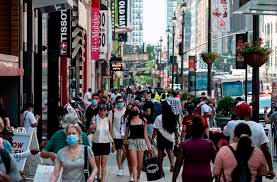 A shopping district in New York City. Low Covid-19 virus transmission, vaccinations, and expanded reopenings have made consumers much more confident, an analyst said. – AFPPIX