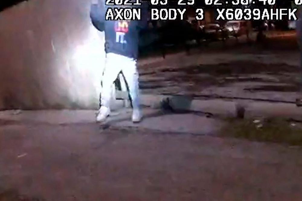This video police body cam image released by the Civilian Office of Police Accountability (COPA) on April 15, 2021, shows a frame grab of 13 year-old Adam Toledo after he was shot by police in Chicago, Illinois on March 29, 2021. –AFP