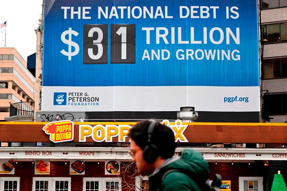 A billboard showing the US national debt is seen in Washington on Thursday/AFPpix