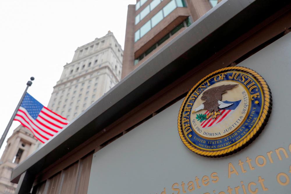 File photo: The seal of the United States Department of Justice is seen on the building exterior of the United States Attorney's Office of the Southern District of New York in Manhattan, New York City, U.S., August 17, 2020. REUTERSpix